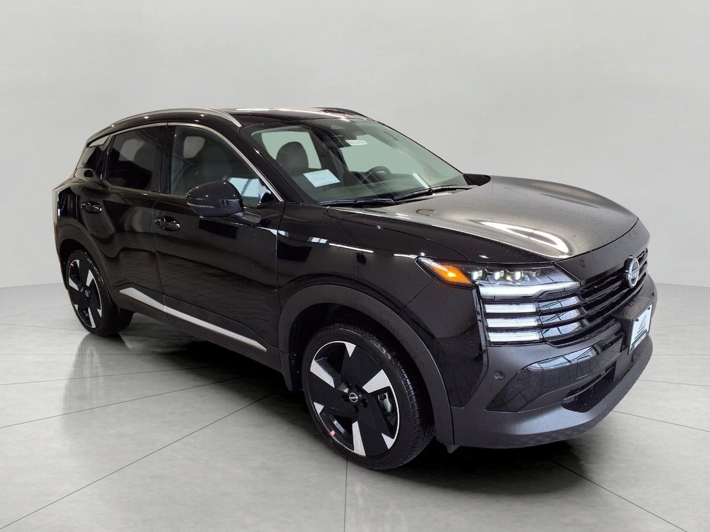 2026 Nissan Kicks SR AWD in Super Black — front three-quarter view