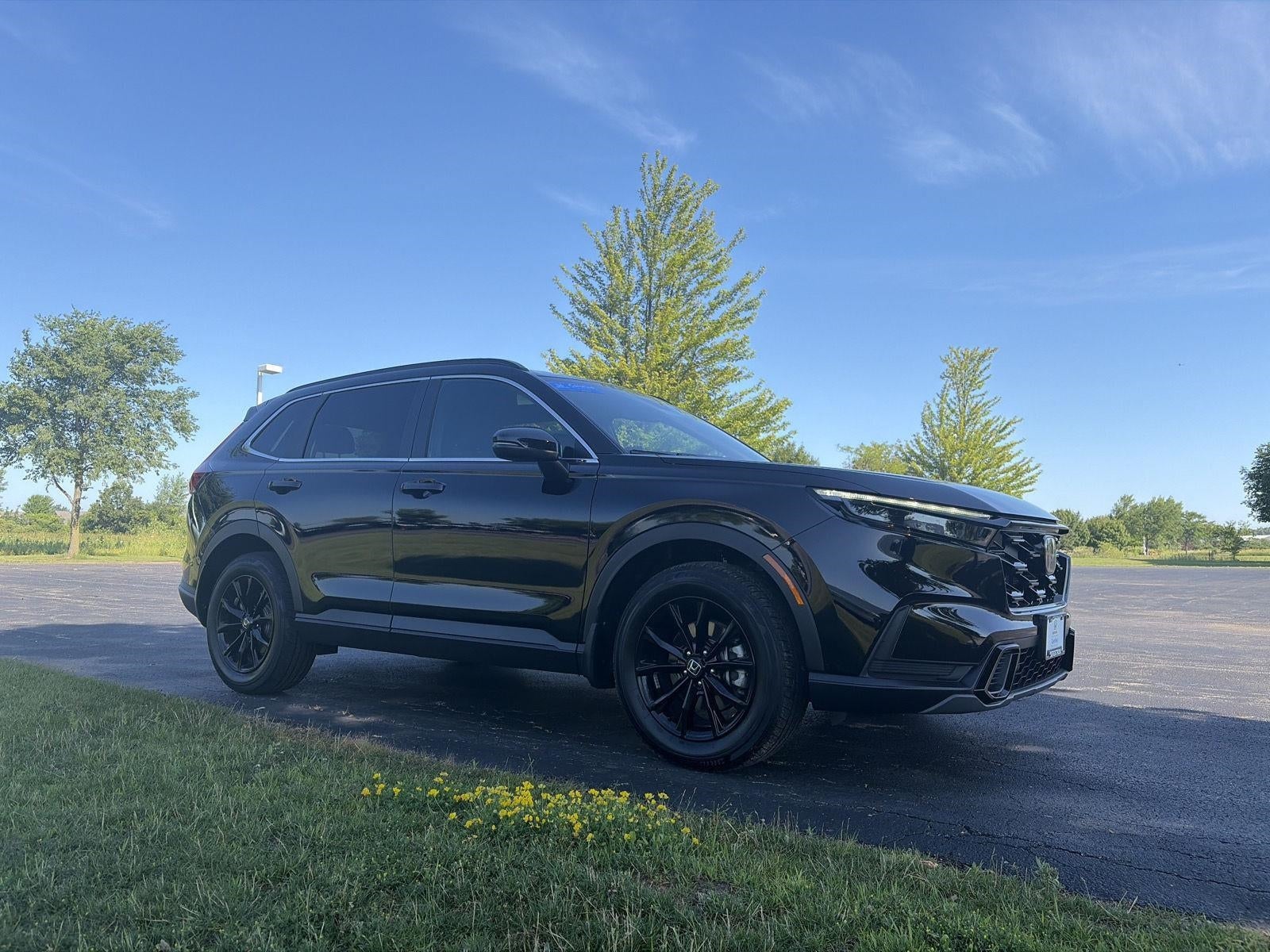 2025 Honda CR-V Hybrid Sport AWD in Other — front three-quarter view